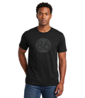 A man wearing an 86 Threads 86'd Tee - black unisex t-shirt with circular 86 logo on chest, restaurant industry apparel